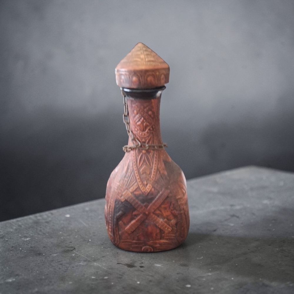 Jeype vintage Spanish glass decanter wrapped in embossed, tooled leather. bottle